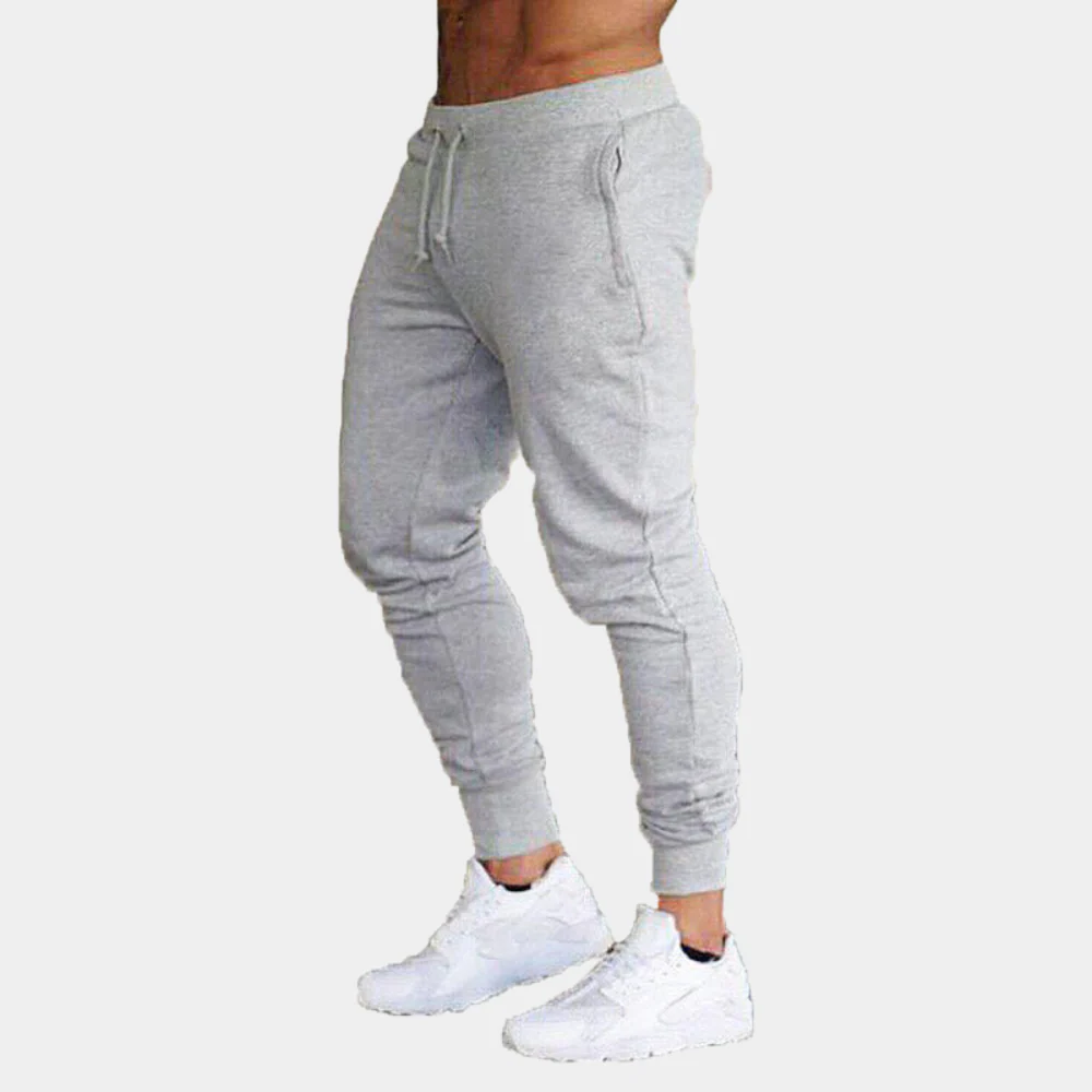 Lightweight & supportive men’s training pants – fitted design, breathable polyester, for summer workouts